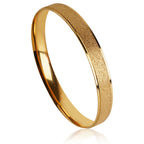 Gold-Tone Matte Finish Round Bangle Bracelet for Women, Minimalist Closed Stainless Steel Jewelry with Brushed Texture, Elegant Slim Wrist Accessory for Everyday Wear